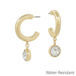 Gold hoop earrings with sparkling circle crystal drop charm, water resistant and lead and cadmium safe.