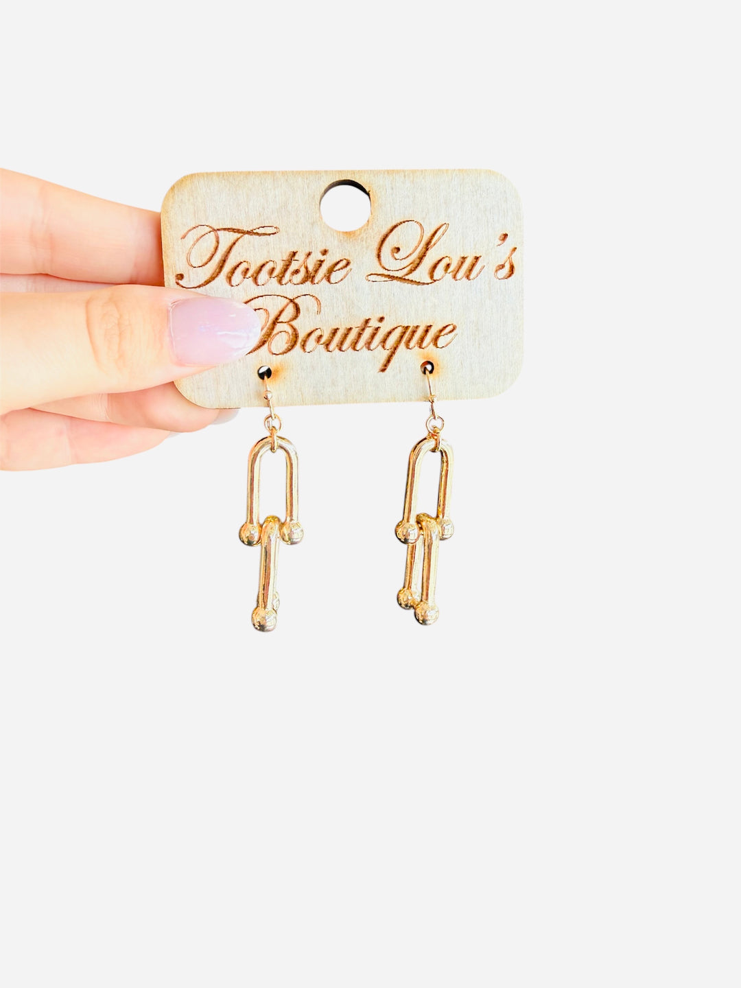 Gold linked earrings with interlocking chain design, water-resistant and lightweight for everyday wear.