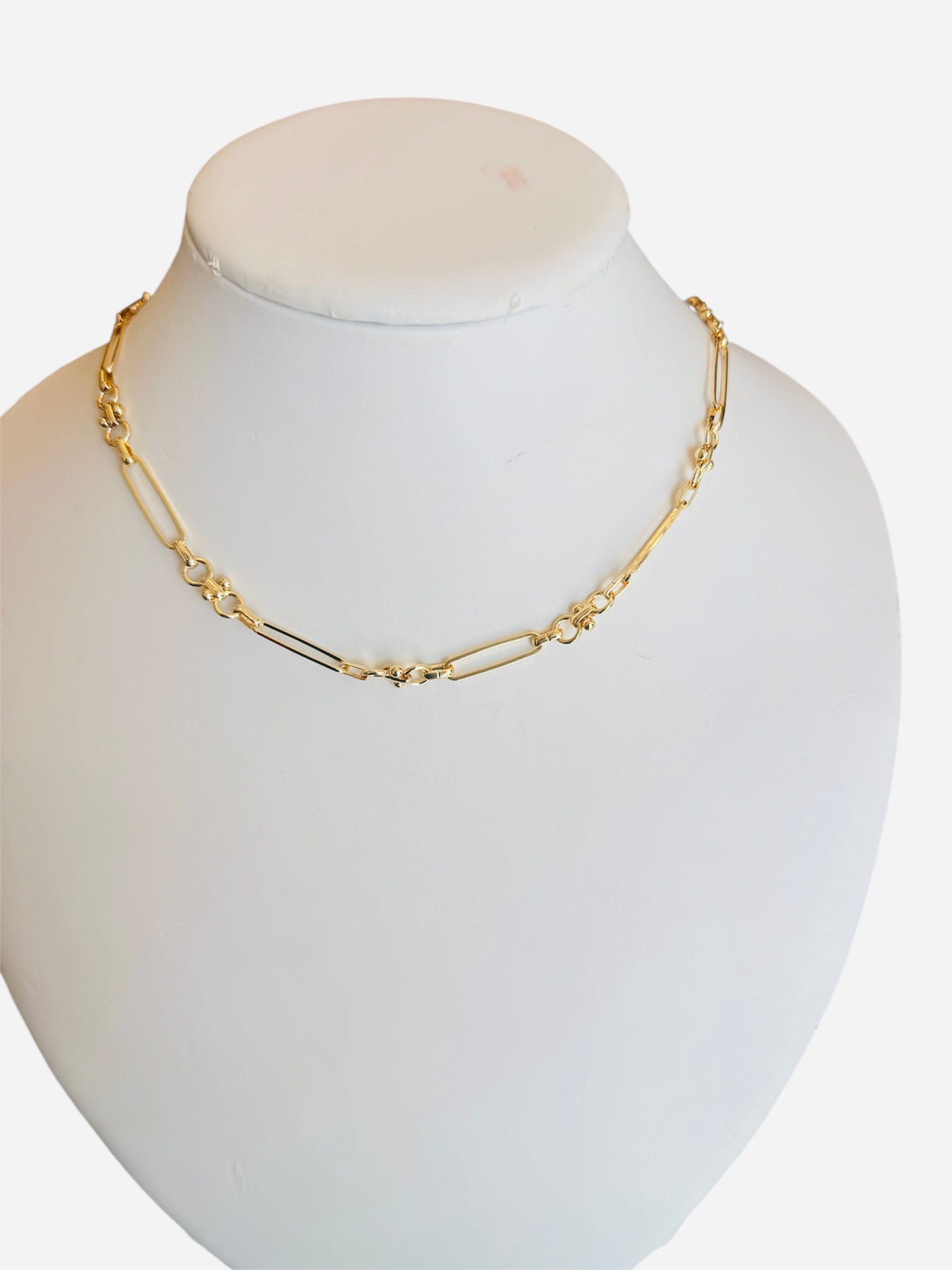 Gold necklace with alternating paperclip links and magnetic clasp for easy, modern style.