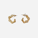 Matte gold wave-shaped hoops accented with tiny sparkling crystals.