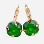 Gold tone drop earrings with faceted green gemstone and fishhook ear wire.