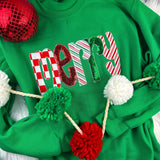 Green sweatshirt with chenille “Merry” patch featuring candy-cane stripes, sequins, and glitter details.