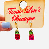 Gold hoop earrings with pink rectangular gem and green round stone drop.