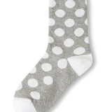 Grey polka dot socks with white heel and toe accents.