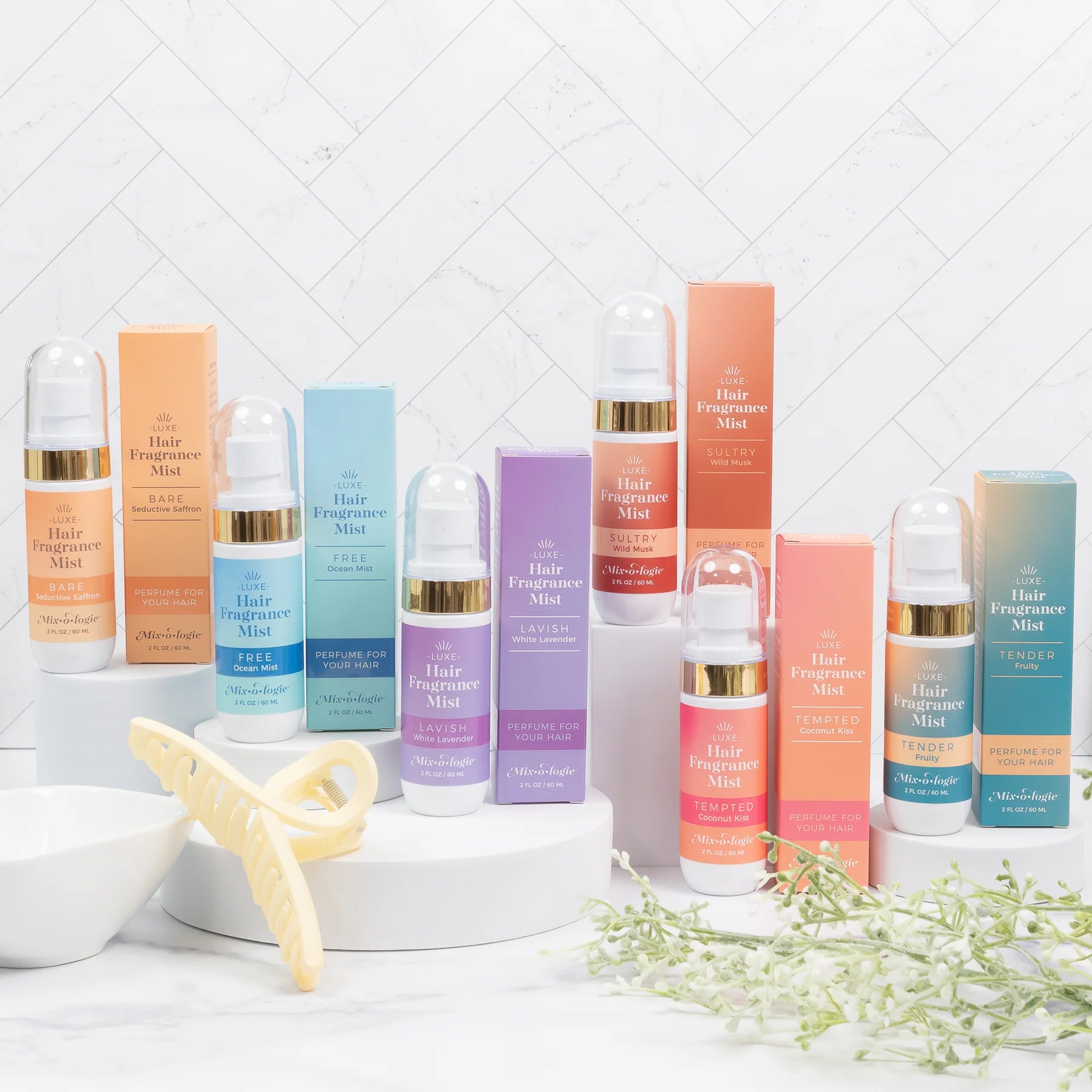 Alcohol-free hair perfume mist adding shine and long-lasting scent without weighing hair down.