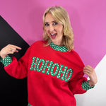 Red Christmas sweatshirt with green HO HO HO letters and white polka dot trim