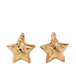 Hammered gold star earrings with lightweight design and textured shine.