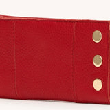Chili Red Hammitt 110 North wallet with brushed gold hardware and multiple card slots.