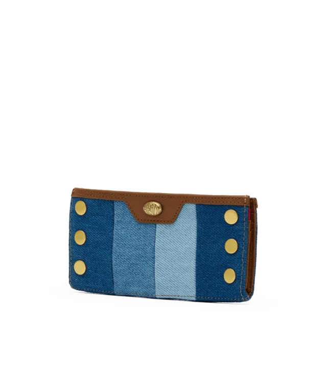 Hammitt 110 North wallet with mixed denim, mahogany leather trim, and antique gold hardware.