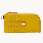 Hammitt 210 East wallet in two-tone yellow pebbled leather with shiny gold hardware.