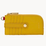 Hammitt 210 East wallet in two-tone yellow pebbled leather with shiny gold hardware.