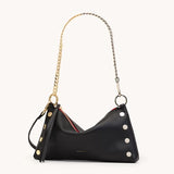 Hammitt Black glossy Hammitt Kyle Revival bag with mixed-metal chain strap and red cotton twill lining.