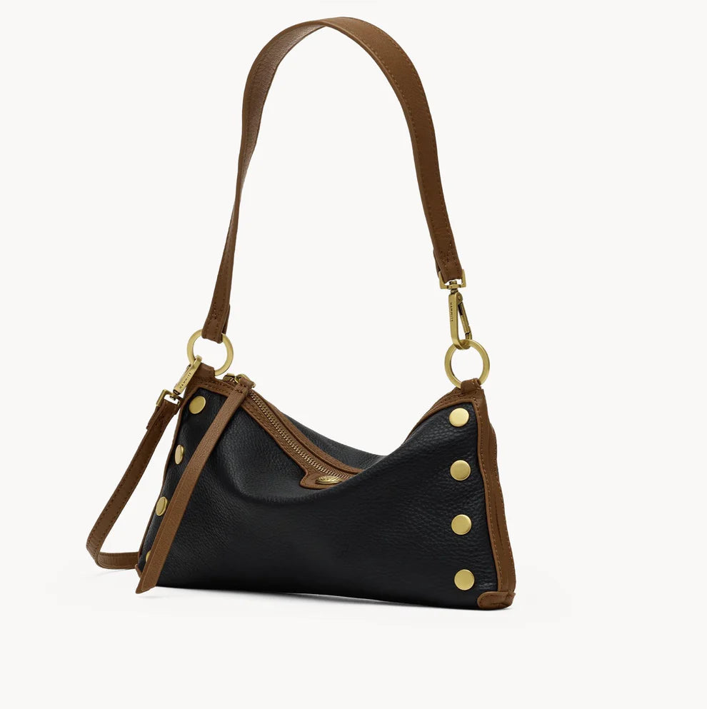 Black and mahogany Hammitt Kyle leather handbag with antique gold hardware and adjustable crossbody strap.