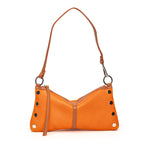 Orange leather convertible handbag with brown strap and silver hardware