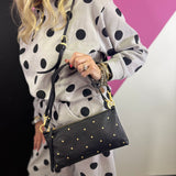 Hammitt Kyle Starlight black pebbled leather handbag with mini rivets and brushed gold hardware.