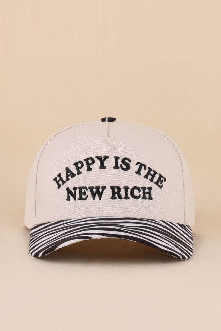 Two-tone snapback hat with Happy Is The New Rich embroidery and zebra print detail.