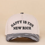 Two-tone snapback hat with Happy Is The New Rich embroidery and zebra print detail.