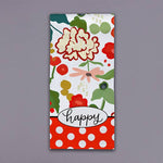Floral tea towel with red flowers, green accents, polka dot border, and happy script detail