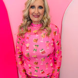 Holiday drinks print mesh top with lettuce hems and mock neckline, perfect for festive layering