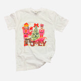 White tee with pink nutcrackers, leopard “Jolly” text, red bow, and festive Christmas tree design.
