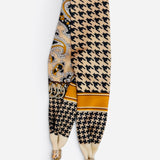 Houndstooth paisley scarf necklace with golden accents, oversized pearl, and sparkling magnetic closure.
