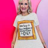 Neutral graphic tee with ruler frame message and rhinestone stud accents