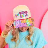 Neutral hat with How Blessed Are We embroidery and pastel patchwork brim.
