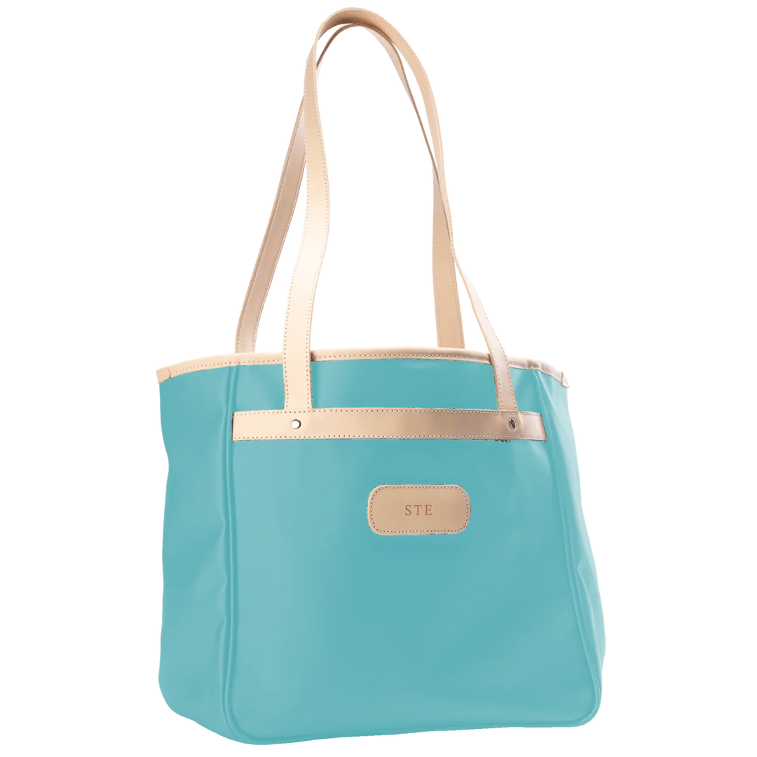 Jon Hart Amelia Tote in ice blue coated canvas with natural leather trim, padded laptop sleeve, trolley sleeve, and spacious interior pockets