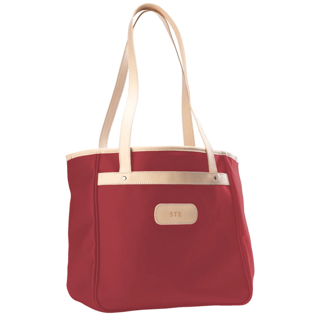 Jon Hart Amelia Tote in red coated canvas with natural leather trim, padded laptop sleeve, trolley sleeve, and spacious interior pockets