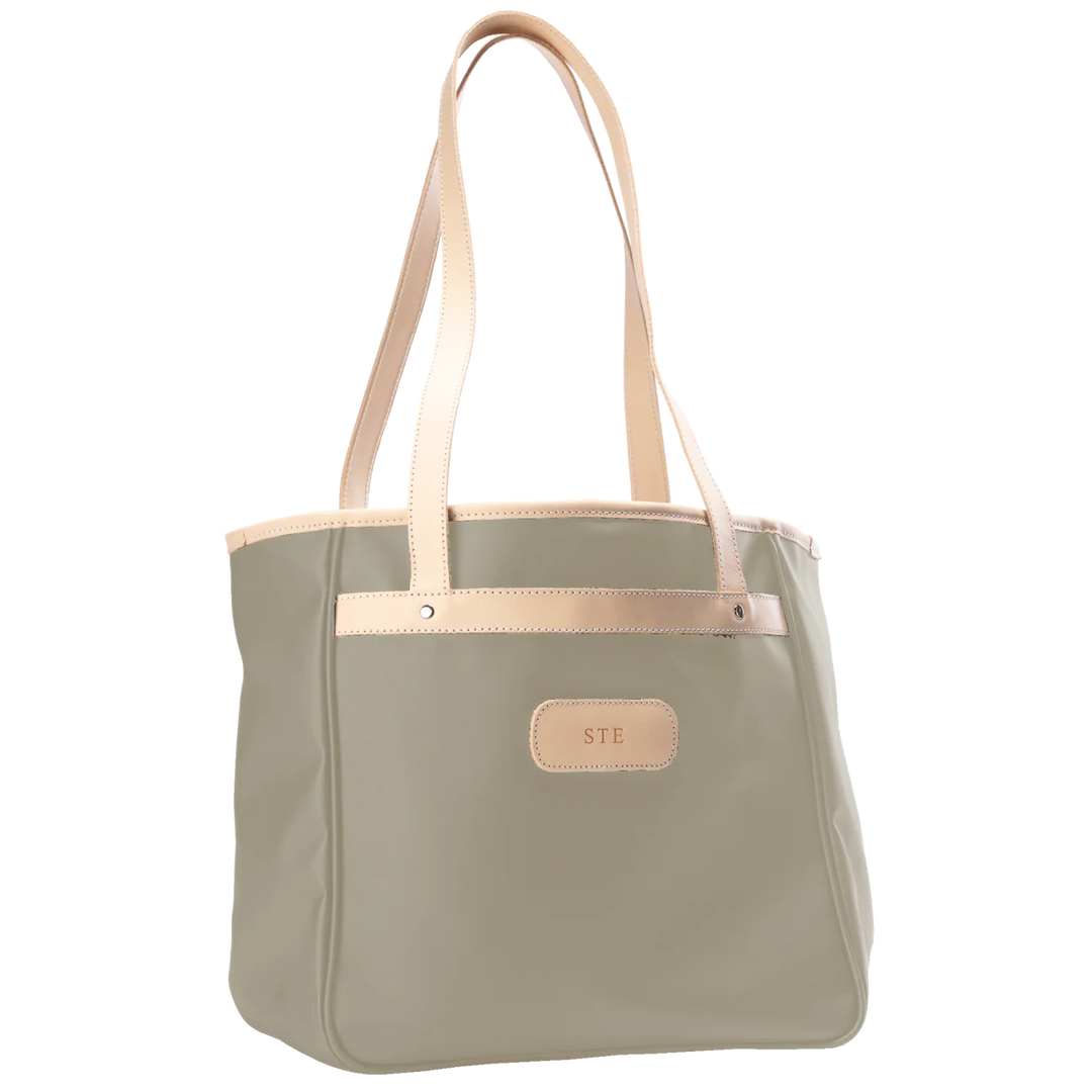 Alamo Heights Tote in tan coated canvas with natural leather trim and black lining.