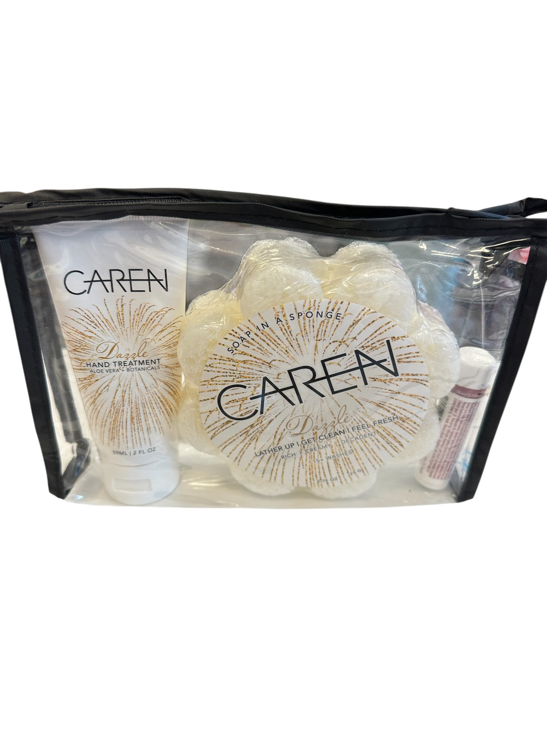 Caren skincare product set in a clear pouch. Dazzle is inspired by Diva.