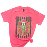 Nutcracker Tee in neon pink with cute nutcracker graphic, unisex fit, and soft 50/50 blend.