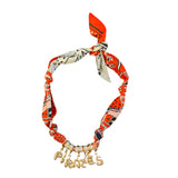 Black and orange Pirates game day scarf necklace with bold bubble letters