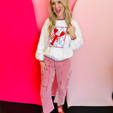 Cream long-sleeve sweater with a large red checkerboard lobster graphic and red striped trim.