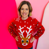 Red reindeer sweater with snowflakes, sparkling eyes, red nose, and sleeve lights for festive flair.
