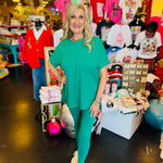Kelly green loungewear set with round neck top and hi-low hem.