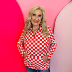 Red and white checkered quarter-zip pullover with collar and kangaroo pocket.