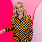 Gold and black checkered quarter-zip pullover with collared neckline and kangaroo pocket.
