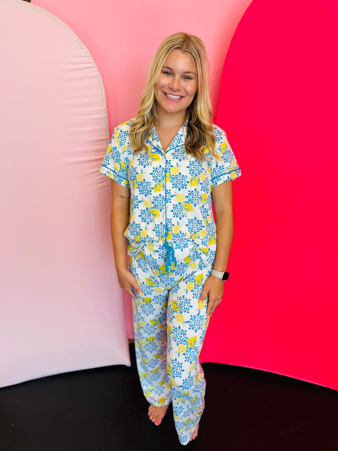 Wide-leg lounge pants in soft, stretchy fabric with elastic waistband, & drawstring tie.