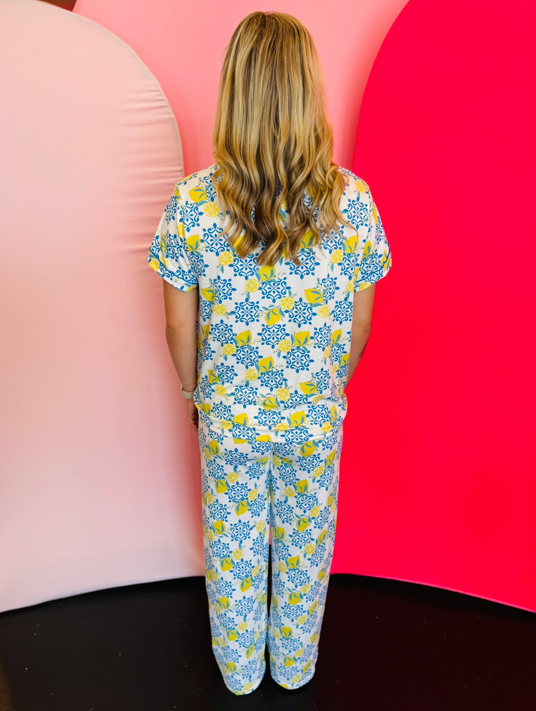 Wide-leg lounge pants in soft, stretchy fabric with elastic waistband, & drawstring tie.