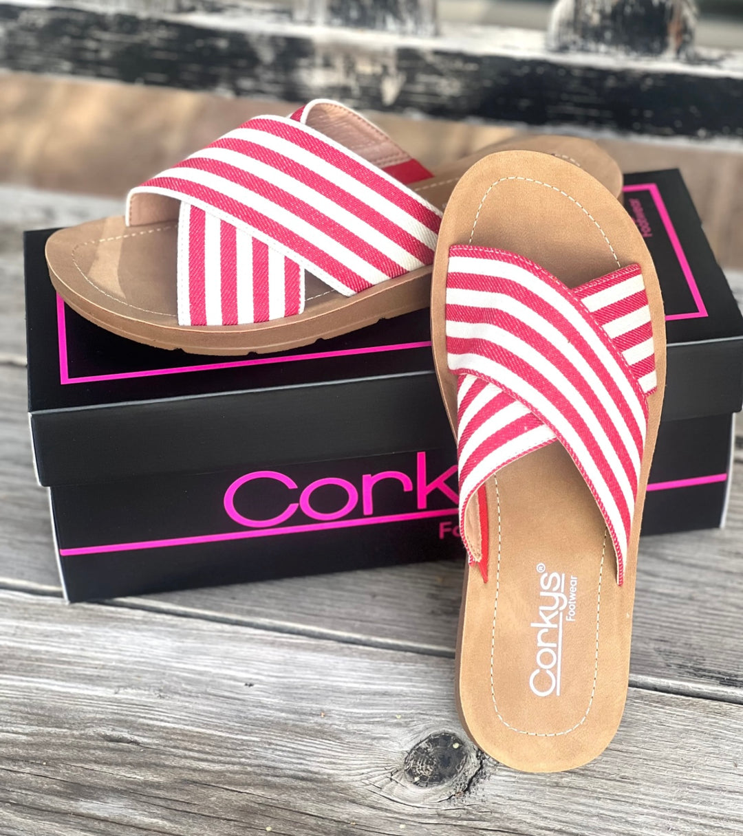 Corky Dig It Red Stripe Sandals featuring a bold red and cream striped fabric upper, cushioned platform footbed, and easy slip-on design. Lightweight and stylish, perfect for casual summer outfits.