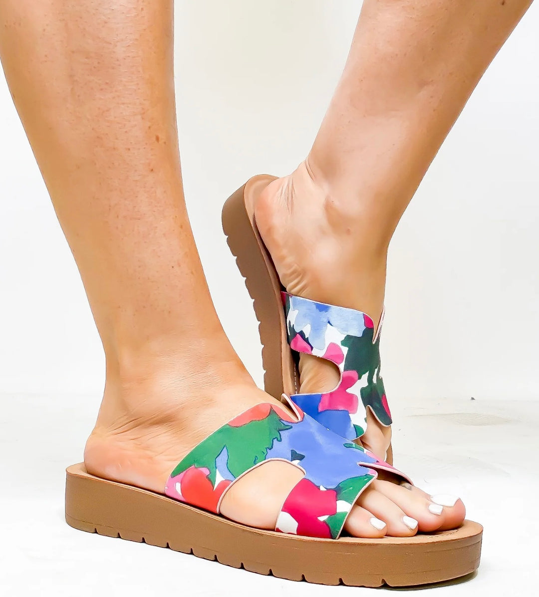 Corky Hold Please Floral Sandals featuring a 1-inch platform sole, cushioned footbed, and a stylish 'H' strap upper with a soft floral print. Designed for comfort and easy everyday wear with a chic, versatile look.