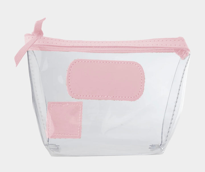 Jon Hart Airport Chico clear TSA-compliant travel pouch with blush Natural Leather trim, flat bottom, and zippered brass closure—perfect for carrying 3oz liquids and travel essentials.