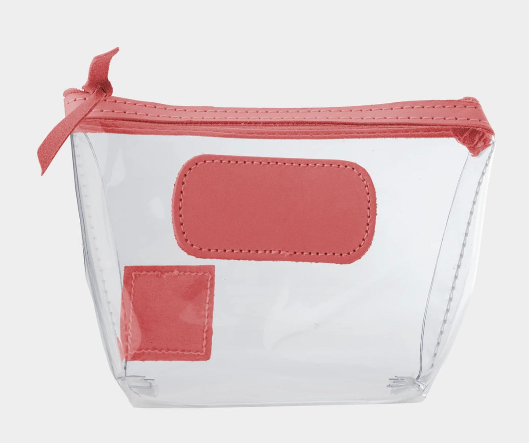 Jon Hart Airport Chico clear TSA-compliant travel pouch with hot pink Natural Leather trim, flat bottom, and zippered brass closure—perfect for carrying 3oz liquids and travel essentials.