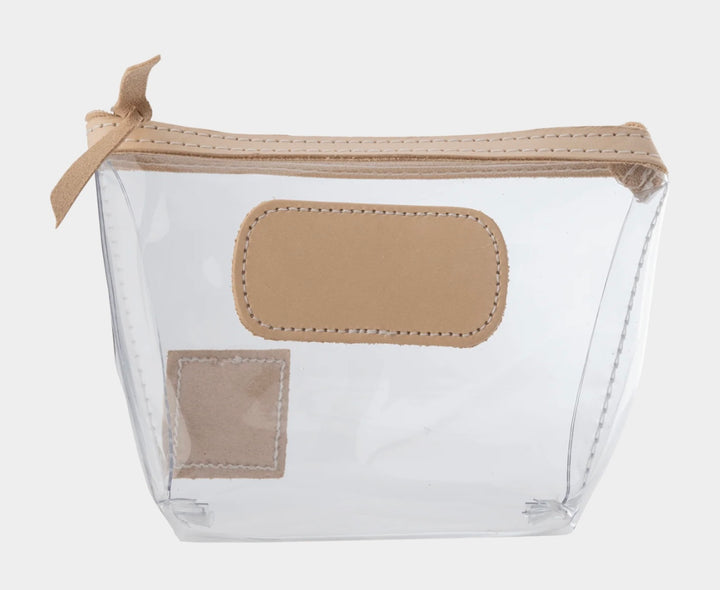 Jon Hart Airport Chico clear TSA-compliant travel pouch with Natural Leather trim, flat bottom, and zippered brass closure—perfect for carrying 3oz liquids and travel essentials.
