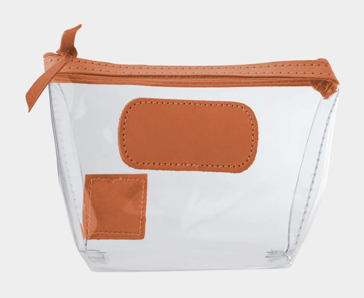 Jon Hart Airport Chico clear TSA-compliant travel pouch with orange Natural Leather trim, flat bottom, and zippered brass closure—perfect for carrying 3oz liquids and travel essentials.