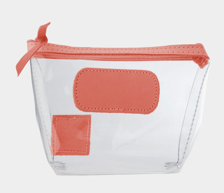 Jon Hart Airport Chico clear TSA-compliant travel pouch with salmon Natural Leather trim, flat bottom, and zippered brass closure—perfect for carrying 3oz liquids and travel essentials.