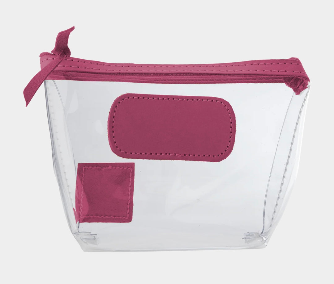 Jon Hart Airport Chico clear TSA-compliant travel pouch with sangria Natural Leather trim, flat bottom, and zippered brass closure—perfect for carrying 3oz liquids and travel essentials.