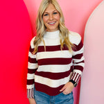 Zenana Cabernet striped cotton sweater with boxy fit, crew neckline, and contrast striped cuffs.