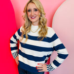 Zenana Navy striped cotton sweater with relaxed boxy fit, crew neckline, and contrast striped cuffs.